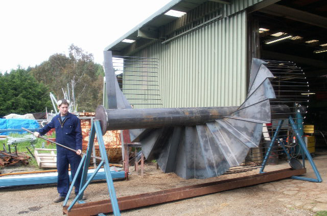 Custom fabricated steel spiral stairs process at workshop- Elliott Engineering