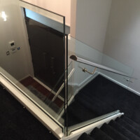 Glass balustrade and stainless steel handrail inside - Oakmont St - Elliott Engineering
