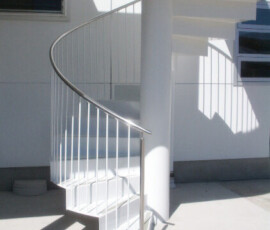 Custom white outdoor spiral staircase Stainless steel handrail - Elliott Engineering